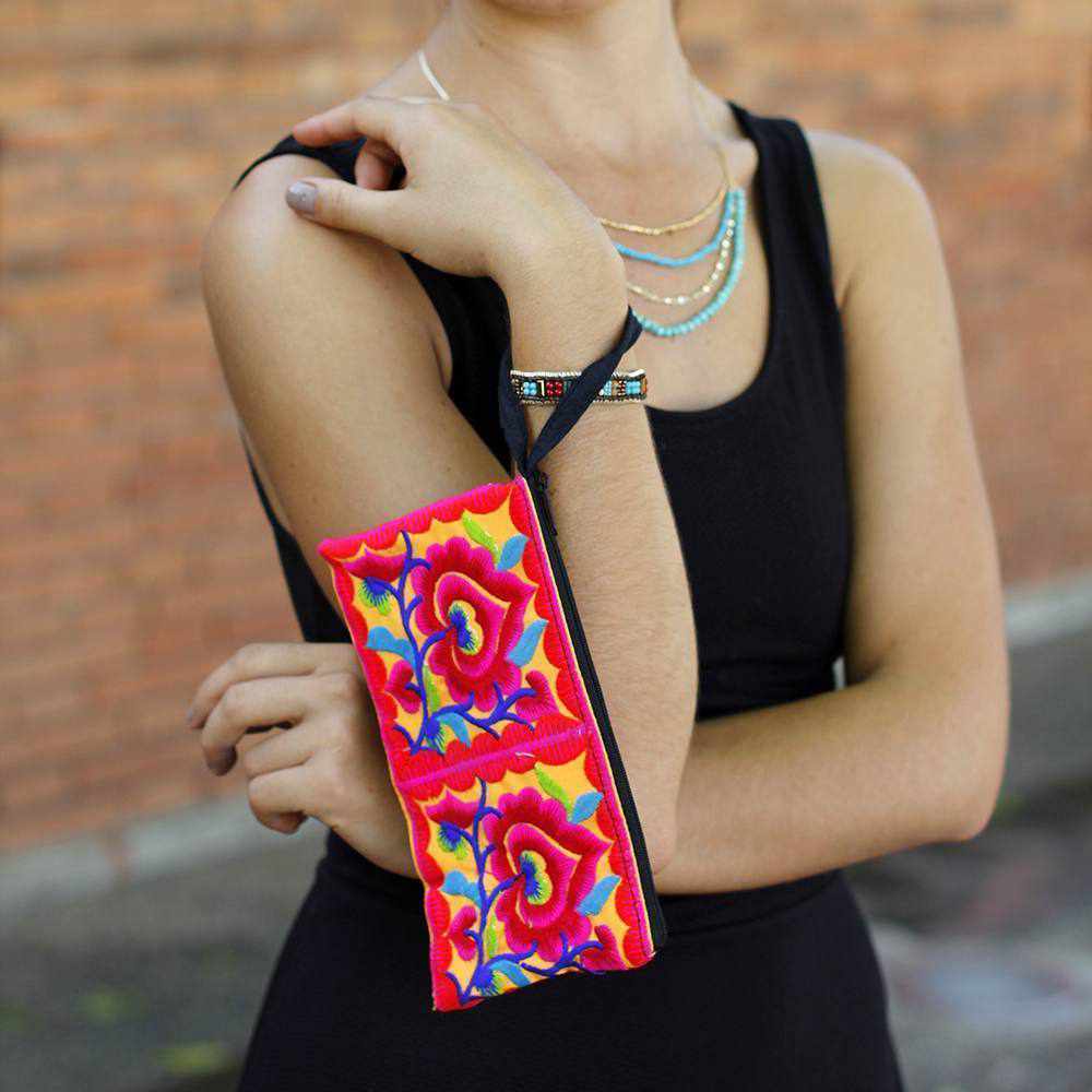 girl holding fair trade bag on her wrist