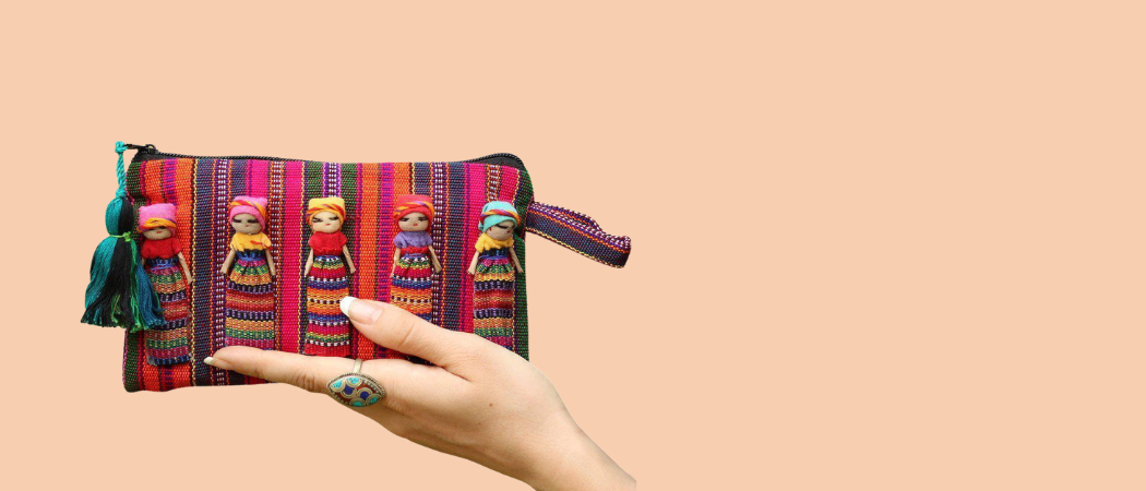 colorful striped bag with worry dolls from guatemala